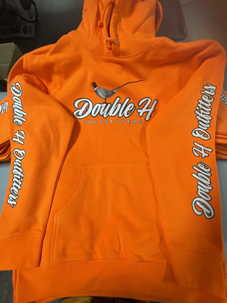 Blaze orange hoodie printed with the Double H pheasant logo on the chest and Double H Outfitters down both sleeves