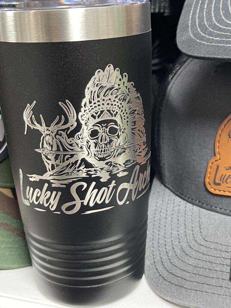 Black tumbler engraved with the Lucky Shot Archery skull, headdress and deer design
