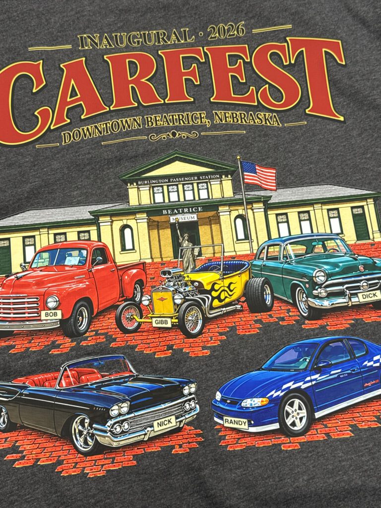 Dark gray shirt printed with the full-color Carfest 2026 design