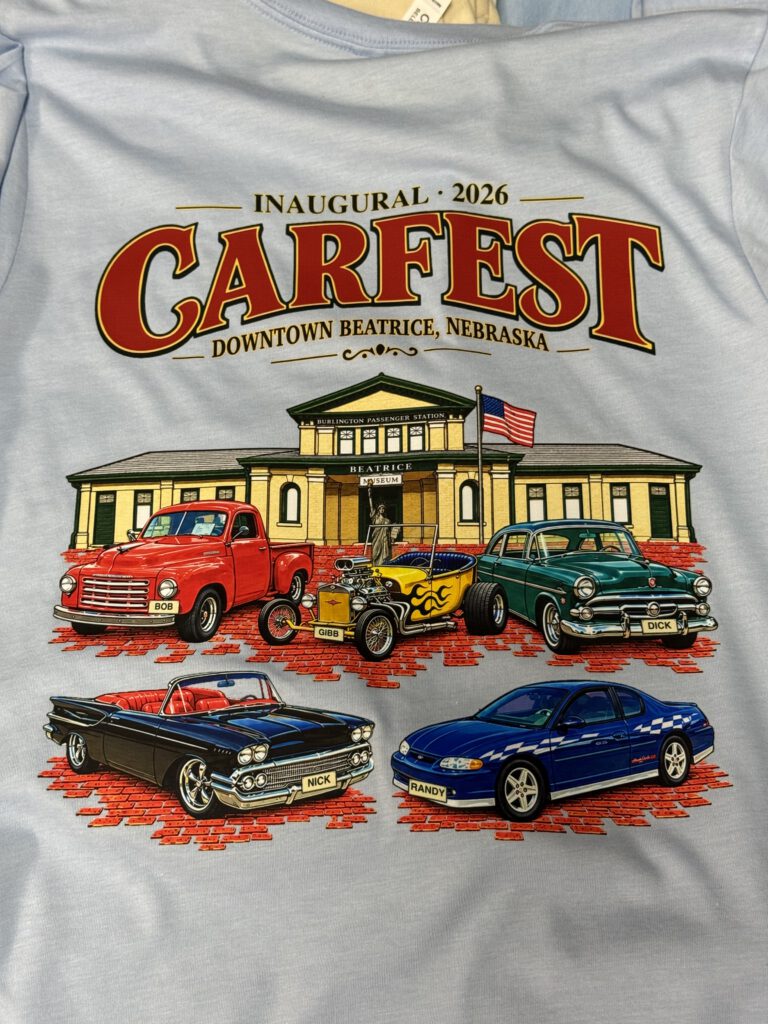 Light blue shirt printed with the full Carfest 2026 design