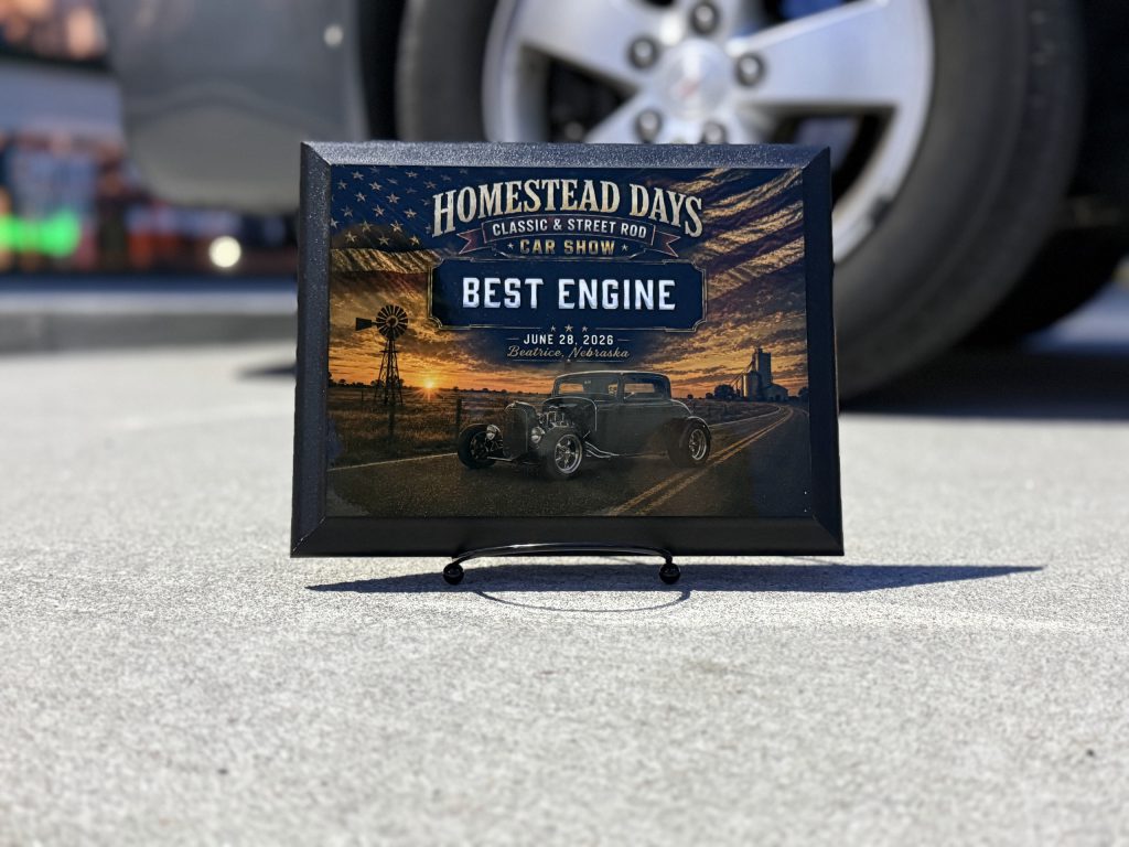 Full-color Homestead Days Best Engine plaque showing a hot rod on a country road at sunset